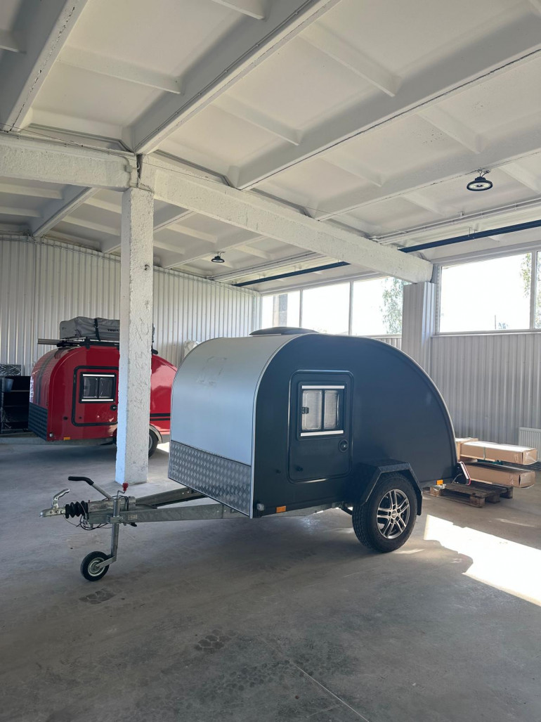 Teardrop trailer in an indoor storage